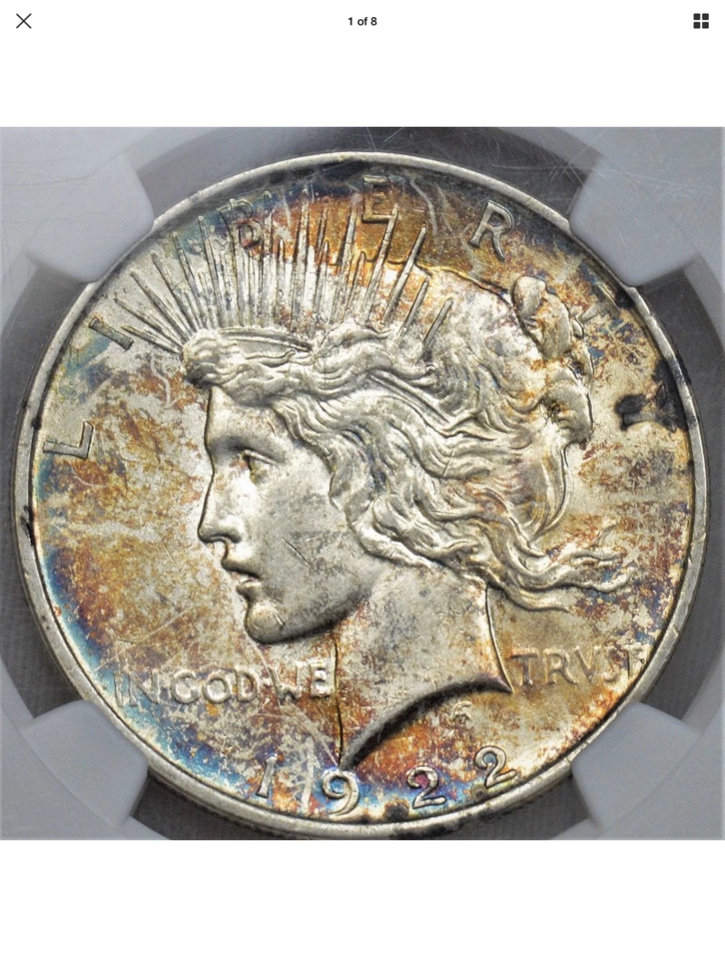 Anyone-Else-Love-Toned-Peace-Dollars?